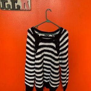 A Hot Topic black and white striped sweater.